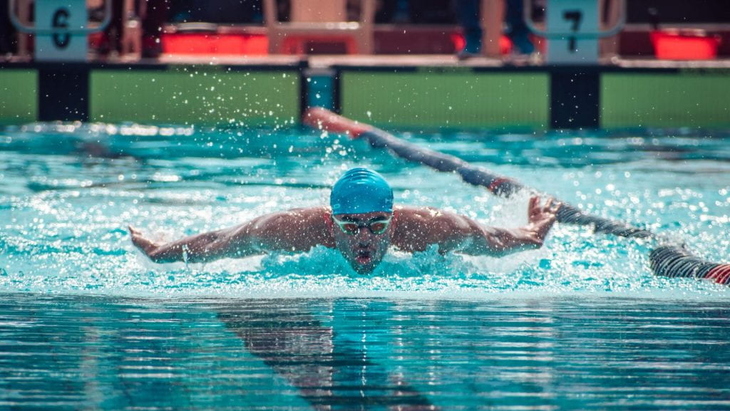 Hemraj Patel competing in swimming